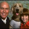Roseanne Sorrentino as Annie and Harve Presnell as Daddy Warbucks w. Sandy during a rehearsal for the Dallas production of the musical "Annie."