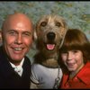 Roseanne Sorrentino as Annie and Harve Presnell as Daddy Warbucks w. Sandy during a rehearsal for the Dallas production of the musical "Annie."