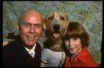 Roseanne Sorrentino as Annie and Harve Presnell as Daddy Warbucks w. Sandy during a rehearsal for the Dallas production of the musical "Annie."