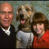 Roseanne Sorrentino as Annie and Harve Presnell as Daddy Warbucks w. Sandy during a rehearsal for the Dallas production of the musical "Annie."