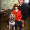 Roseanne Sorrentino as Annie and Harve Presnell as Daddy Warbucks w. Sandy during a rehearsal for the Dallas production of the musical "Annie."