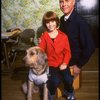 Roseanne Sorrentino as Annie and Harve Presnell as Daddy Warbucks w. Sandy during a rehearsal for the Dallas production of the musical "Annie."