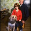 Roseanne Sorrentino as Annie and Harve Presnell as Daddy Warbucks w. Sandy during a rehearsal for the Dallas production of the musical "Annie."