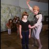 Roseanne Sorrentino as Annie and Patricia Drylie as Miss Hannigan w. orphans during a rehearsal for the Dallas production of the musical "Annie."