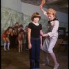 Roseanne Sorrentino as Annie and Patricia Drylie as Miss Hannigan w. orphans during a rehearsal for the Dallas production of the musical "Annie."