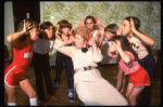 Patricia Drylie as Miss Hannigan w. orphans during a rehearsal for the Dallas production of the musical "Annie."