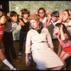 Patricia Drylie as Miss Hannigan w. orphans during a rehearsal for the Dallas production of the musical "Annie."