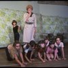 Roseanne Sorrentino as Annie and Patricia Drylie as Miss Hannigan w. orphans during a rehearsal for the Dallas production of the musical "Annie."