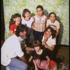 Roseanne Sorrentino as Annie (C) w. director/lyricist Martin Charnin and orphans during a rehearsal for the Dallas production of the musical "Annie."