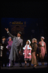 Roseanne Sorrentino as Annie, Harve Presnell as Daddy Warbucks and Deborah Jean Templin as Grace in a scene from the Dallas production of musical "Annie."