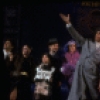 Roseanne Sorrentino as Annie, Harve Presnell as Daddy Warbucks and Deborah Jean Templin as Grace in a scene from the Dallas production of musical "Annie."