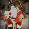 Actress Roseanne Sorrentino as Annie w. Sandy and Santa Claus in a scene from the Dallas production of musical "Annie."