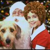Actress Roseanne Sorrentino as Annie w. Sandy and Santa Claus in a scene from the Dallas production of musical "Annie."