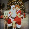 Actress Roseanne Sorrentino as Annie w. Sandy and Santa Claus in a scene from the Dallas production of musical "Annie."