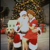Actress Roseanne Sorrentino as Annie w. Sandy and Santa Claus in a scene from the Dallas production of musical "Annie."