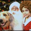 Actress Roseanne Sorrentino as Annie w. Sandy and Santa Claus in a scene from the Dallas production of musical "Annie."