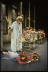 Roseanne Sorrentino as Annie and Patricia Drylie as Miss Hannigan w. orphans in a scene from the Dallas production of musical "Annie."