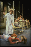 Roseanne Sorrentino as Annie and Patricia Drylie as Miss Hannigan w. orphans in a scene from the Dallas production of musical "Annie."