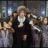 Actress Patricia Drylie as Miss Hannigan w. orphans in a scene from the Dallas production of musical "Annie."