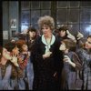 Actress Patricia Drylie as Miss Hannigan w. orphans in a scene from the Dallas production of musical "Annie."