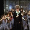 Actress Patricia Drylie as Miss Hannigan w. orphans in a scene from the Dallas production of musical "Annie."