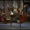 L-R) Katharine Buffaloe as Lily, Michael Leeds as Rooster and Patricia Drylie as Miss Hannigan in a scene from the Dallas production of musical "Annie."