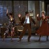 L-R) Katharine Buffaloe as Lily, Michael Leeds as Rooster and Patricia Drylie as Miss Hannigan in a scene from the Dallas production of musical "Annie."