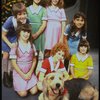 Roseanne Sorrentino as Annie w. Sandy and orphans in a scene from the Dallas production of musical "Annie."