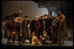 Roseanne Sorrentino as Annie w. Sandy and Hooverville-ites in a scene from the Dallas production of musical "Annie."