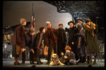 Roseanne Sorrentino as Annie w. Sandy and Hooverville-ites in a scene from the Dallas production of musical "Annie."