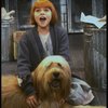 Actress Mary K. Lombardi as Annie w. Sandy in a scene from the Chicago production of the musical "Annie."