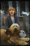 Actress Mary K. Lombardi as Annie w. Sandy in a scene from the Chicago production of the musical "Annie."
