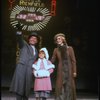 Ellen Martin as Grace, Mary K. Lombardi as Annie and Norwood Smith as Daddy Warbucks in a scene from the Chicago production of the musical "Annie."