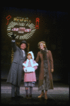 Ellen Martin as Grace, Mary K. Lombardi as Annie and Norwood Smith as Daddy Warbucks in a scene from the Chicago production of the musical "Annie."