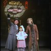 Ellen Martin as Grace, Mary K. Lombardi as Annie and Norwood Smith as Daddy Warbucks in a scene from the Chicago production of the musical "Annie."