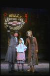 Ellen Martin as Grace, Mary K. Lombardi as Annie and Norwood Smith as Daddy Warbucks in a scene from the Chicago production of the musical "Annie."