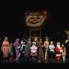 Ellen Martin as Grace, Mary K. Lombardi as Annie and Norwood Smith as Daddy Warbucks in a scene from the Chicago production of the musical "Annie."