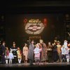 Ellen Martin as Grace, Mary K. Lombardi as Annie and Norwood Smith as Daddy Warbucks in a scene from the Chicago production of the musical "Annie."