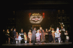Ellen Martin as Grace, Mary K. Lombardi as Annie and Norwood Smith as Daddy Warbucks in a scene from the Chicago production of the musical "Annie."