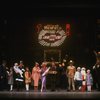 Ellen Martin as Grace, Mary K. Lombardi as Annie and Norwood Smith as Daddy Warbucks in a scene from the Chicago production of the musical "Annie."