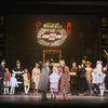 Ellen Martin as Grace, Mary K. Lombardi as Annie and Norwood Smith as Daddy Warbucks in a scene from the Chicago production of the musical "Annie."