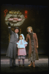 Ellen Martin as Grace, Mary K. Lombardi as Annie and Norwood Smith as Daddy Warbucks in a scene from the Chicago production of the musical "Annie."