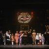 Ellen Martin as Grace, Mary K. Lombardi as Annie and Norwood Smith as Daddy Warbucks in a scene from the Chicago production of the musical "Annie."