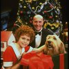 Mary K. Lombardi as Annie and Norwood Smith as Daddy Warbucks w. Sandy in a scene from the Chicago production of the musical "Annie."