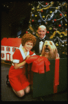 Mary K. Lombardi as Annie and Norwood Smith as Daddy Warbucks w. Sandy in a scene from the Chicago production of the musical "Annie."