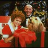 Mary K. Lombardi as Annie and Norwood Smith as Daddy Warbucks w. Sandy in a scene from the Chicago production of the musical "Annie."