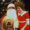 Mary K. Lombardi as Annie w. Santa Claus and Sandy in a scene from the Chicago production of the musical "Annie."