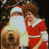 Mary K. Lombardi as Annie w. Santa Claus and Sandy in a scene from the Chicago production of the musical "Annie."