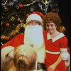 Mary K. Lombardi as Annie w. Santa Claus and Sandy in a scene from the Chicago production of the musical "Annie."