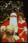 Mary K. Lombardi as Annie w. Santa Claus and Sandy in a scene from the Chicago production of the musical "Annie."